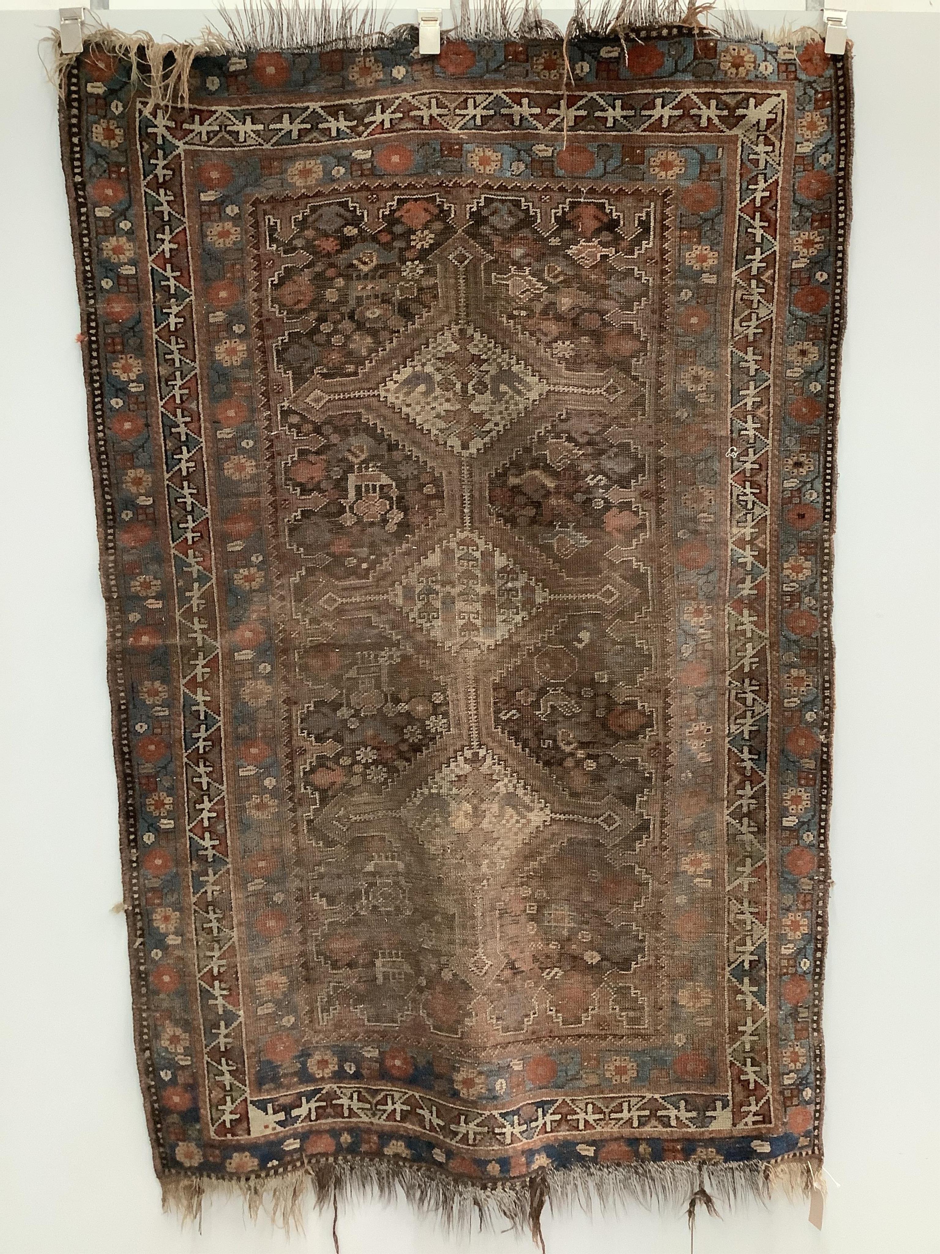 An antique Caucasian rug, Belouch mat and one other, largest 180 x 120cm. Condition - poor to good